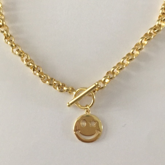 Jewelry - Gold rolo chain with smiley face charm.